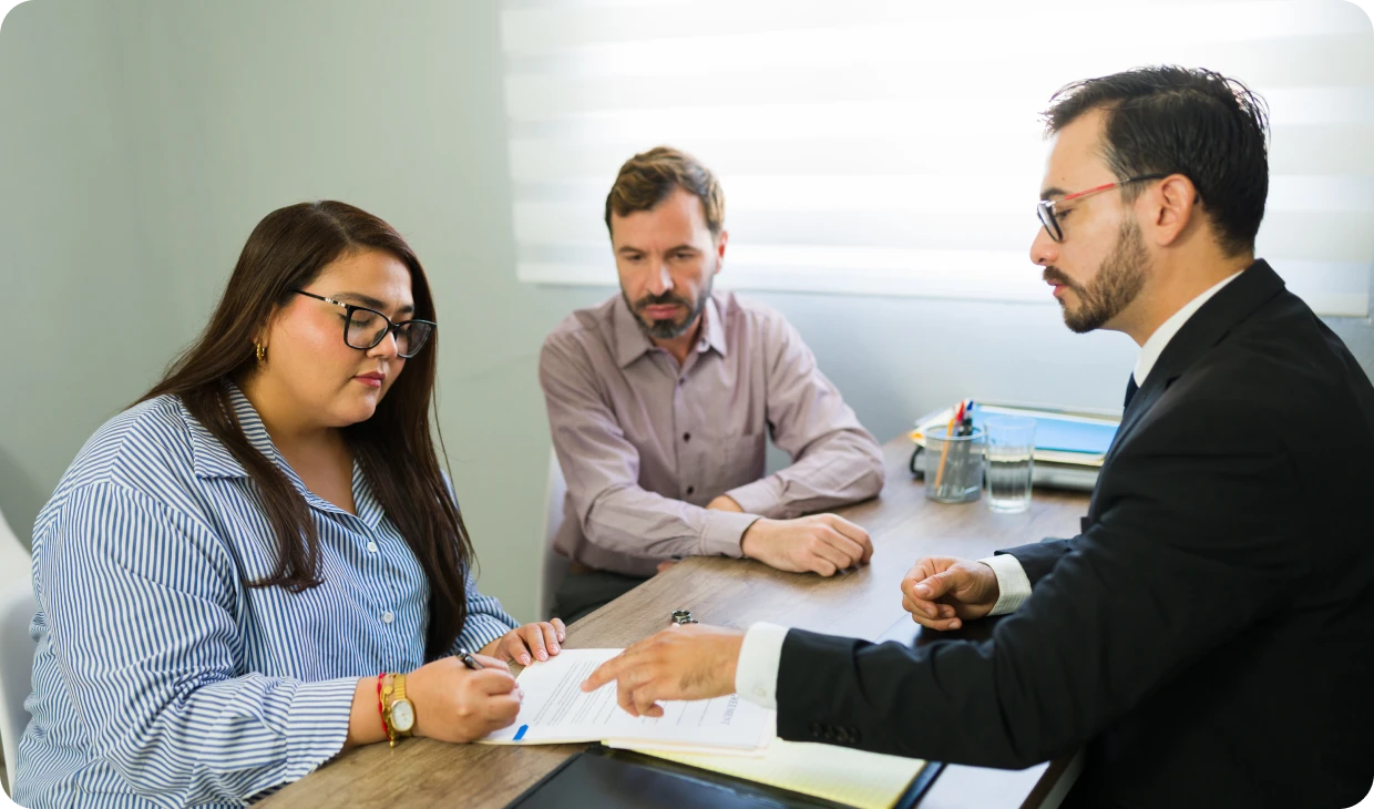 Business meeting with three individuals