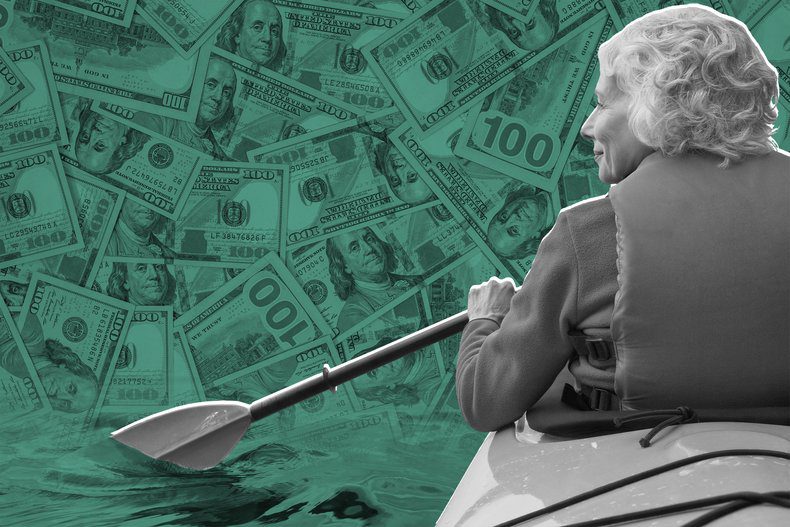 Elderly woman kayaking through money
